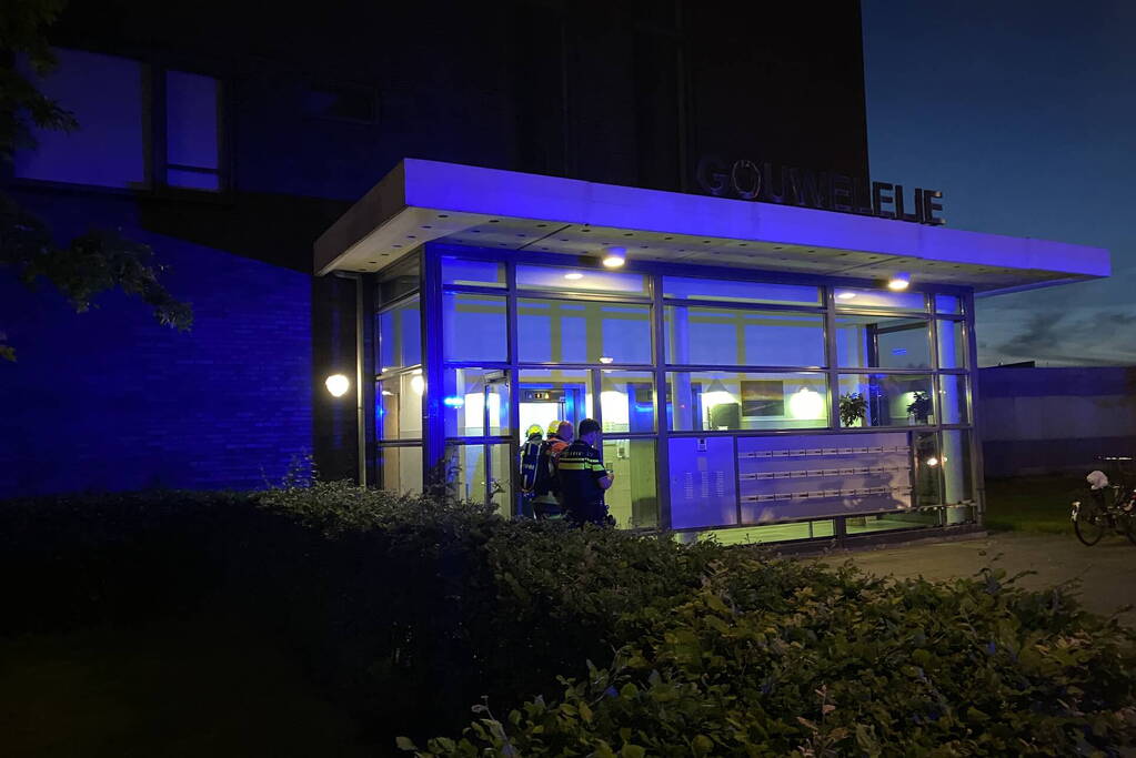 Brand in flat door wasmachine