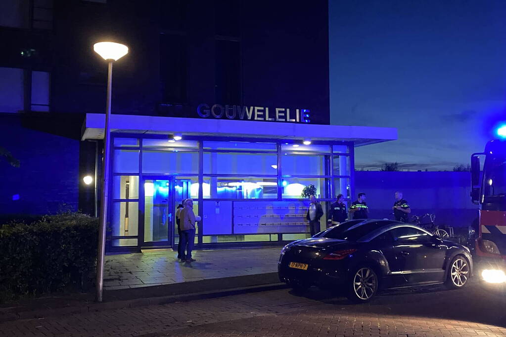 Brand in flat door wasmachine