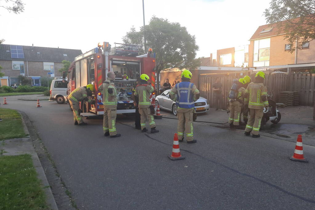 Accu van scooter vat vlam