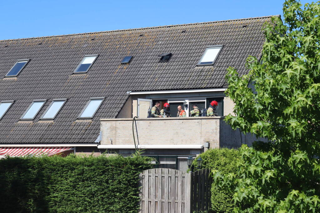 Brand op bovenste verdieping van hoekwoning