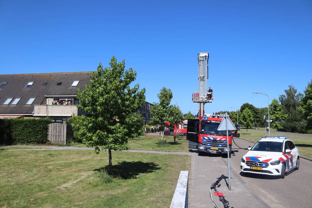 Brand op bovenste verdieping van hoekwoning