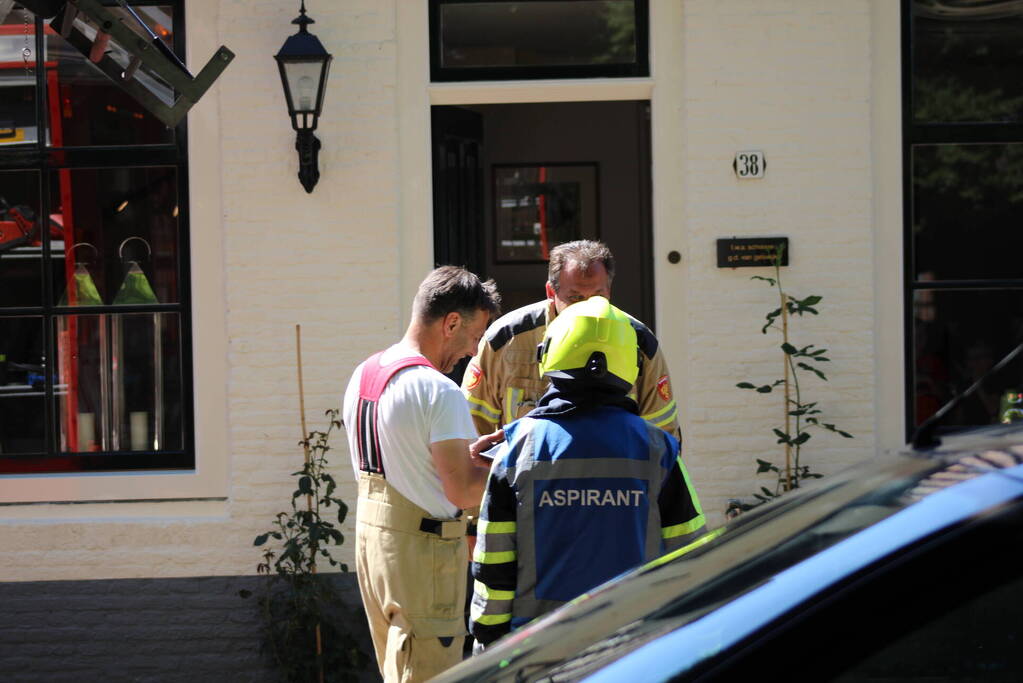 Brand in schuur tussen twee woningen