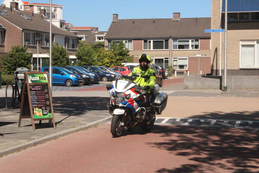 Aanrijding tussen scooter en oudere fietser