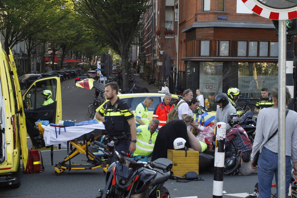 Persoon bekneld na ongeval met bezorgscooter