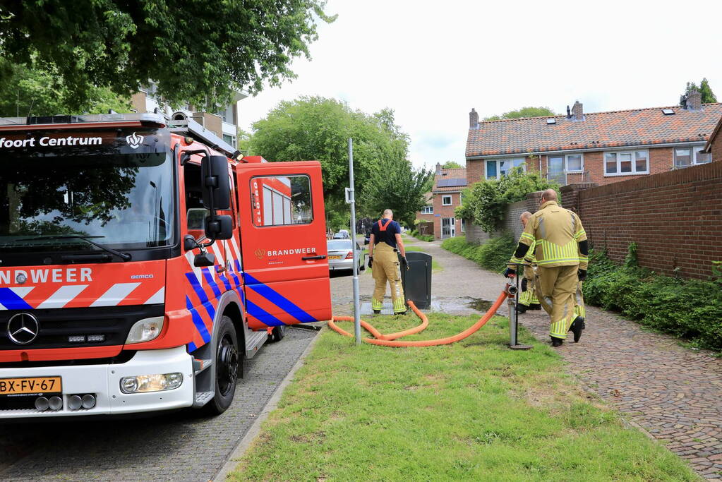 Ondergrondse container in brand