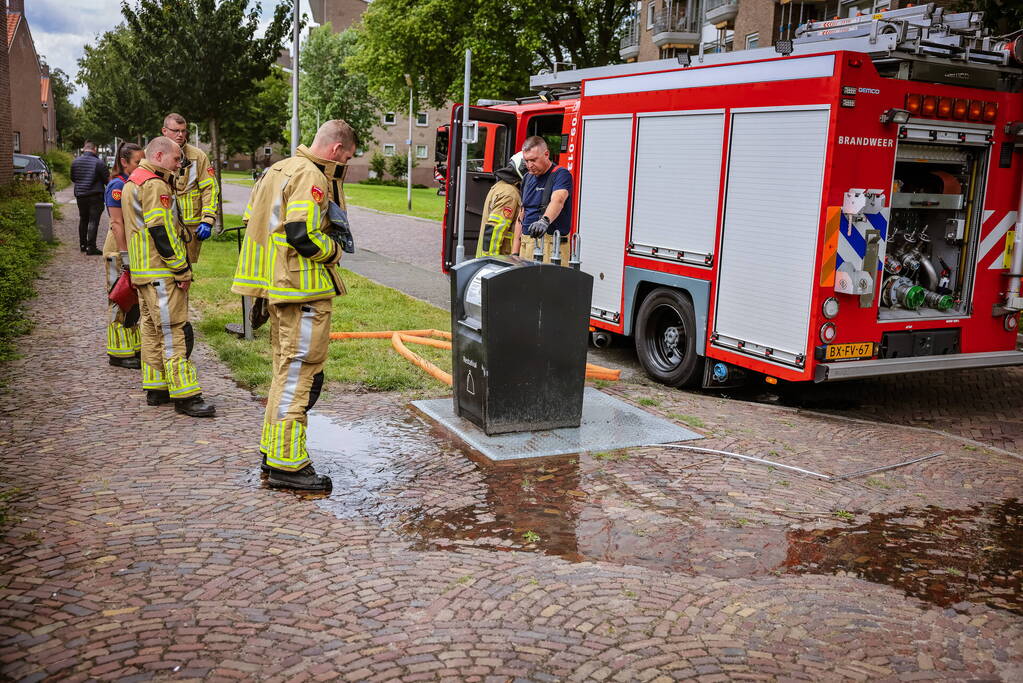 Ondergrondse container in brand