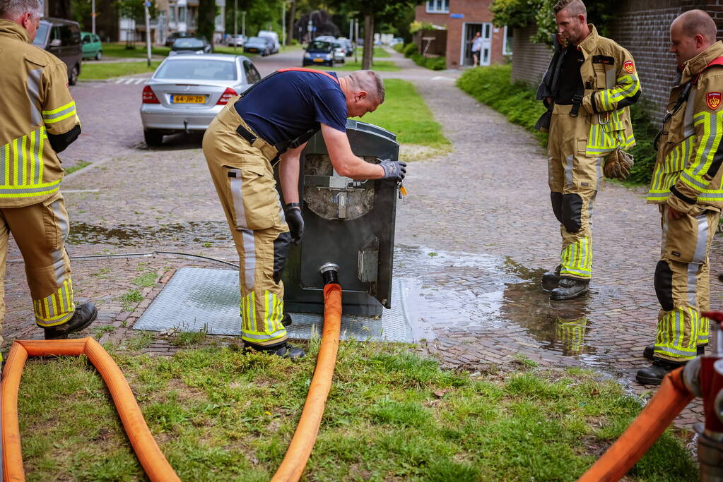 Ondergrondse container in brand