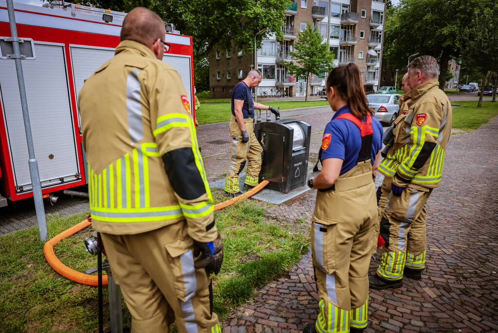 Ondergrondse container in brand