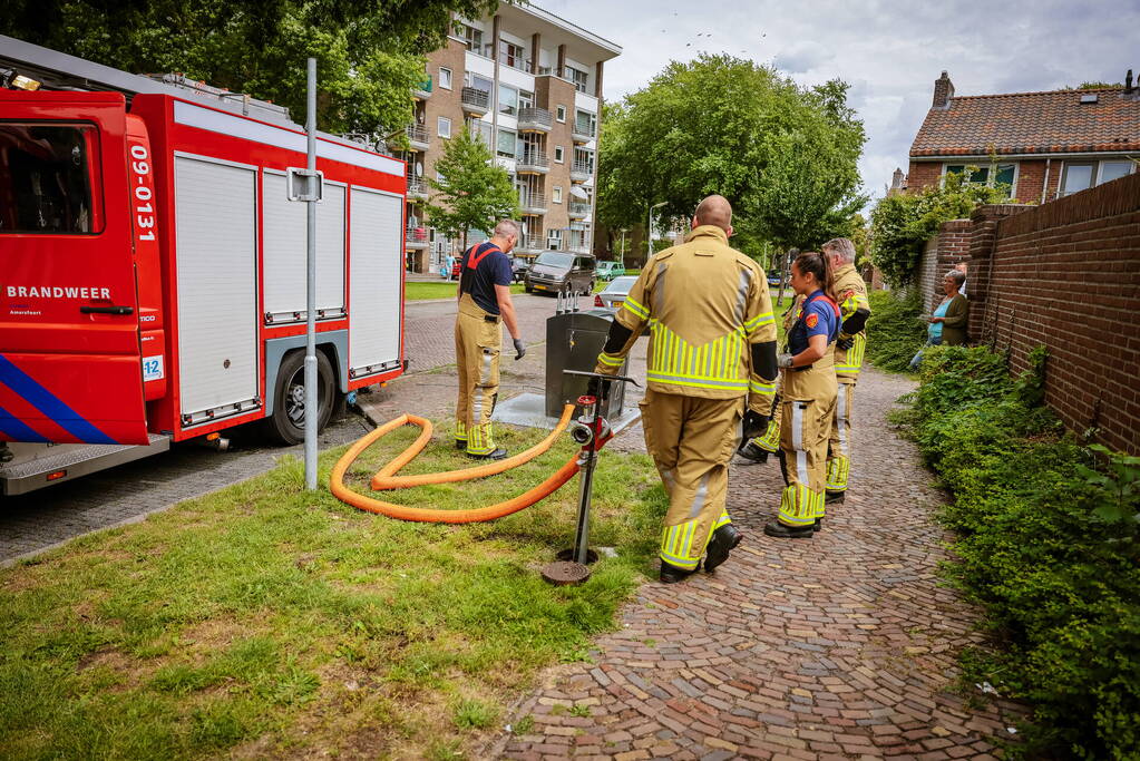 Ondergrondse container in brand