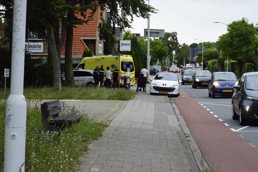 Bezorger in botsing met auto