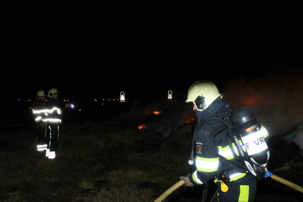 Rookontwikkeling vanwege brand in hooibalen