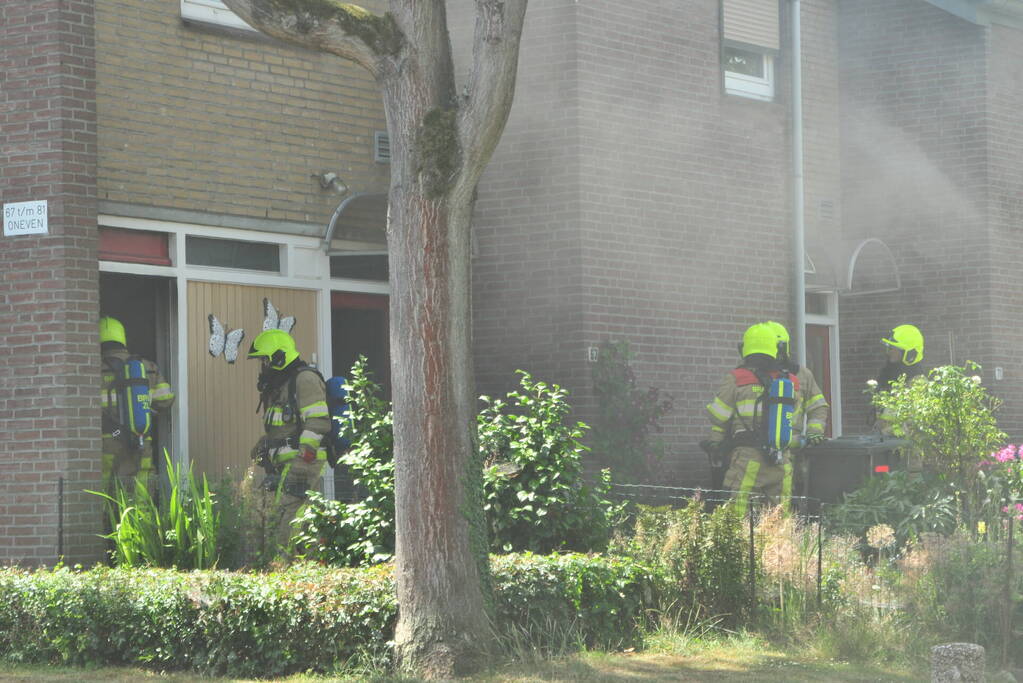 Rook bij brand in woning