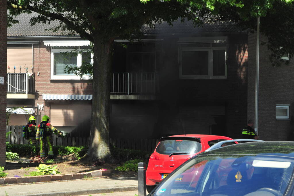 Rook bij brand in woning