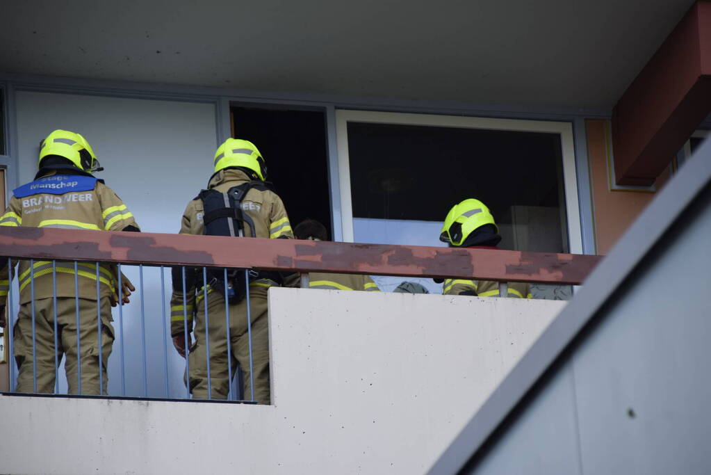 Bewoner sluit zichzelf buiten met eten nog in oven
