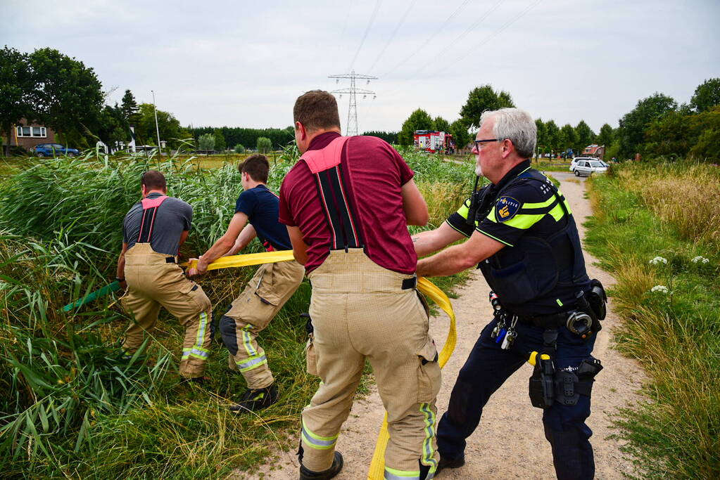 Persoon belandt met scootmobiel in sloot