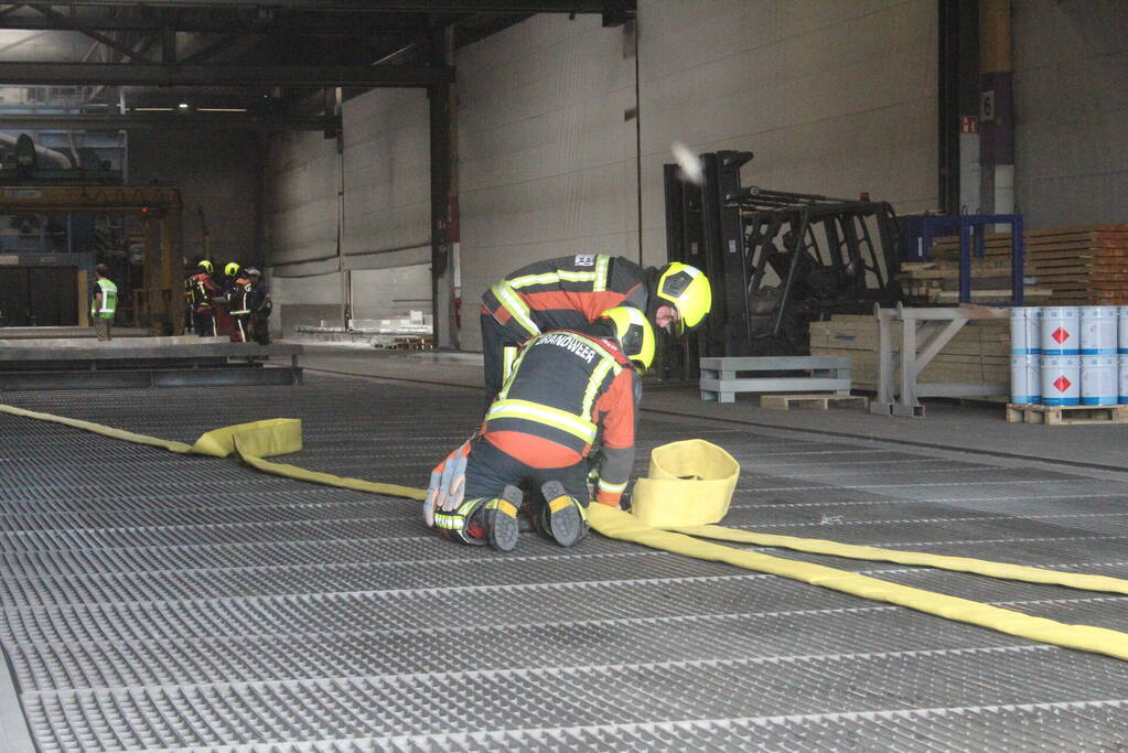 Brand in loods snel onder controle