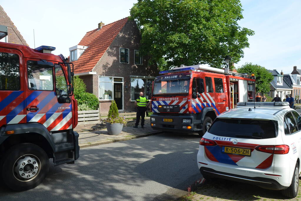 Brand in bijgebouw achter woning