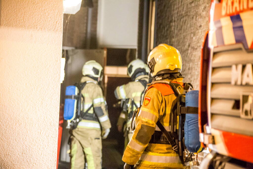 Wasdroger in brand in flatgebouw