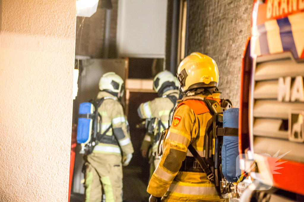 Wasdroger in brand in flatgebouw