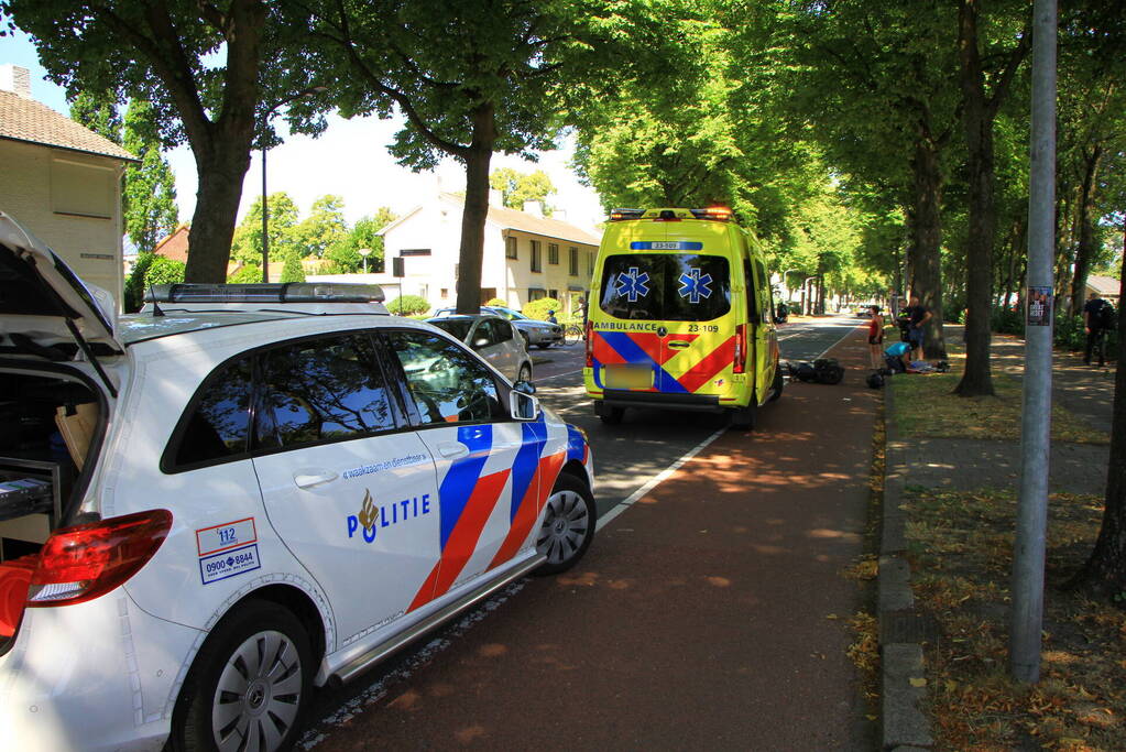 Scooterrijder en opzittende gewond bij ongeval