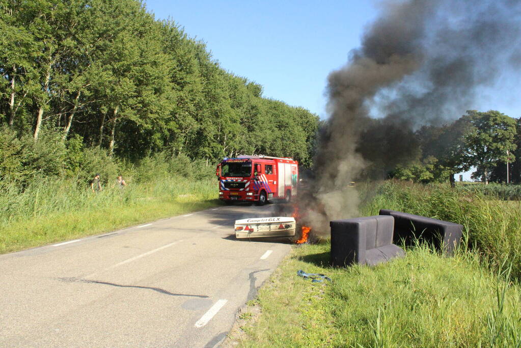 Vouwwagen vat vlam tijdens rijden