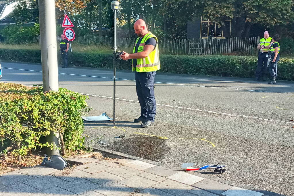 Motoragent botst op politiewagen
