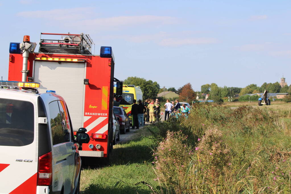 Scootmobiel en racefietser botsen op elkaar