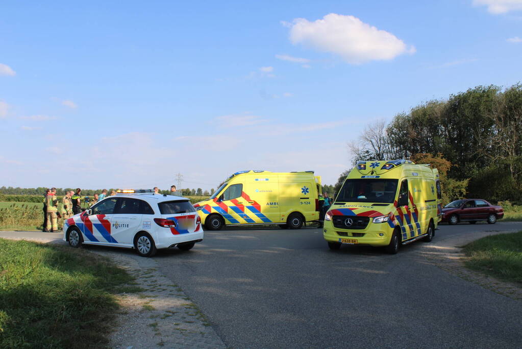 Scootmobiel en racefietser botsen op elkaar