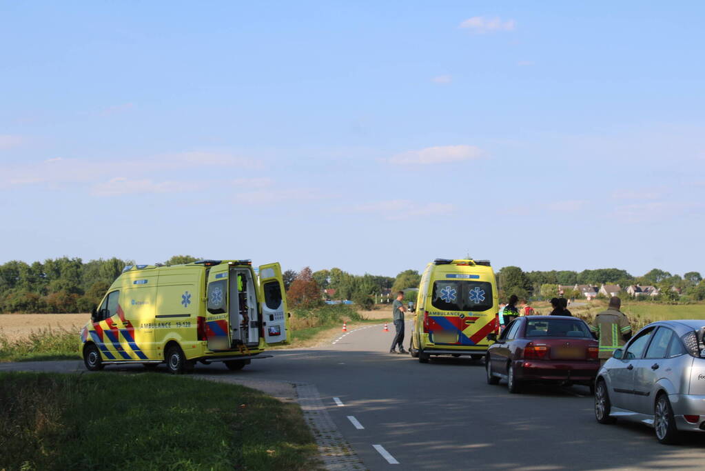 Scootmobiel en racefietser botsen op elkaar