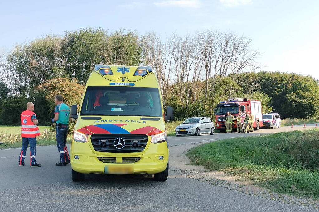 Scootmobiel en racefietser botsen op elkaar