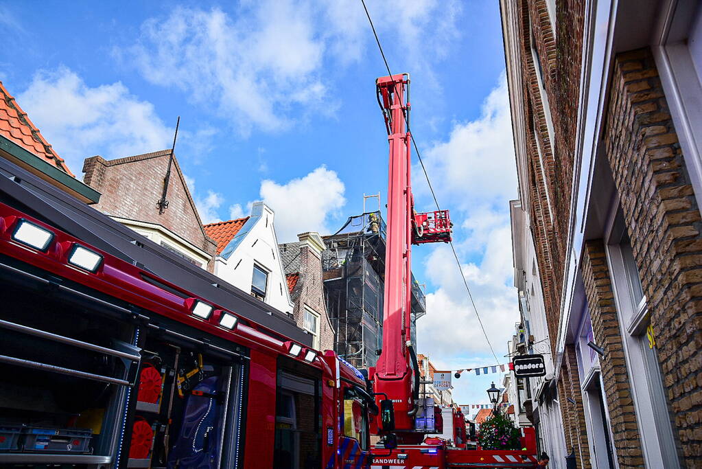 Veel schade na uitslaande brand op dak kerk