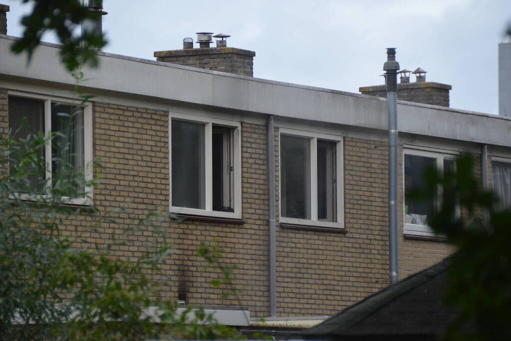 Kat gewond bij woningbrand