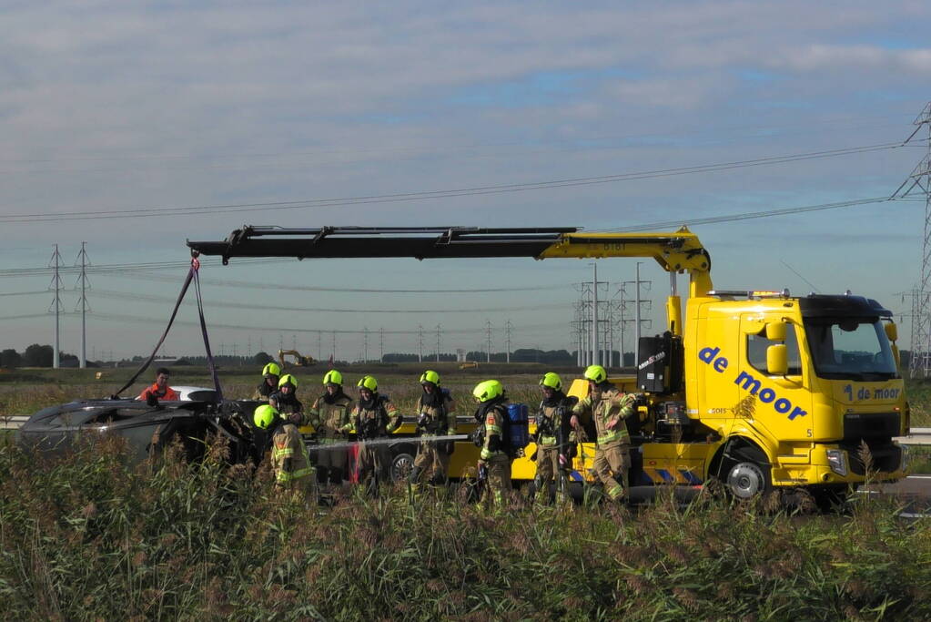 Auto total-loss vanwege brand in motorcompartiment