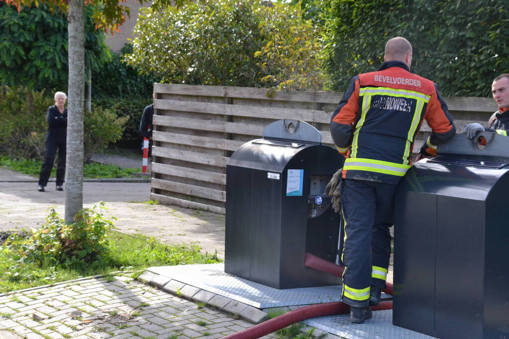 Ondergrondse container in brand
