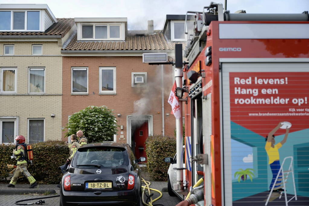Flinke rookontwikkeling bij brand in woning