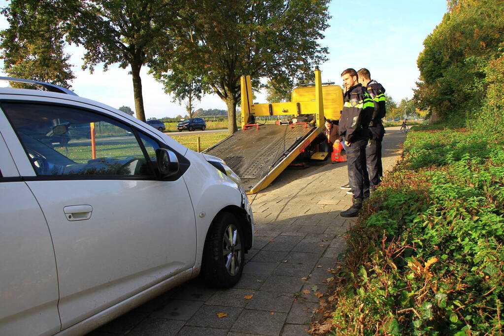 Twee automobilisten in botsing na uitwijken voor ambulance