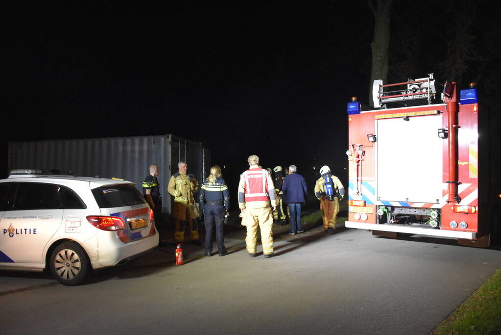 Brand in grote container snel geblust