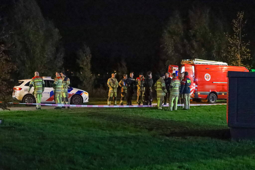 Persoon te water bij Albert Heijn supermarkt