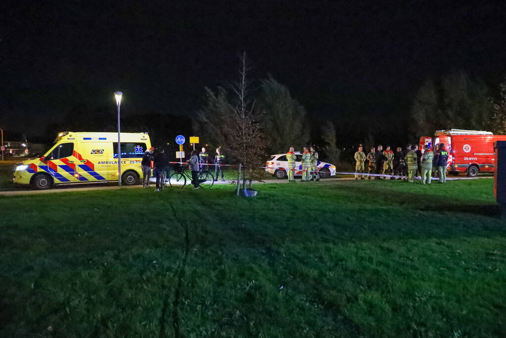 Persoon te water bij Albert Heijn supermarkt