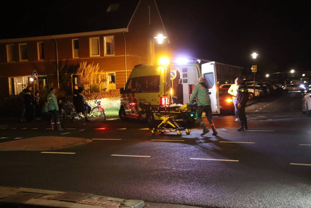 Fietser en automobilist in botsing