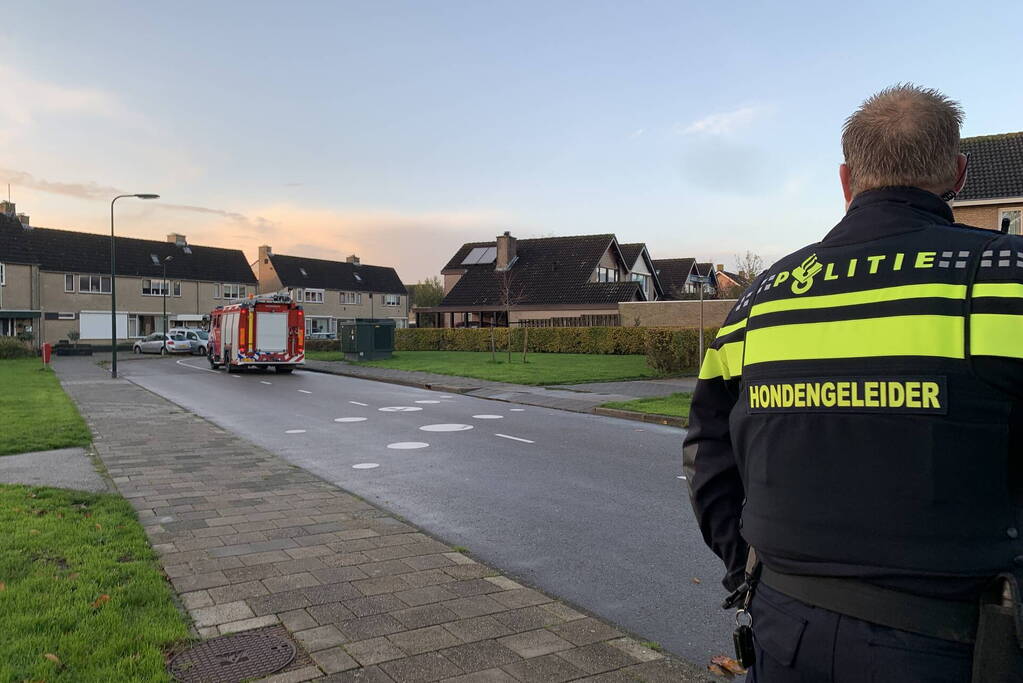 Meisje vast tussen de spaken van de fiets