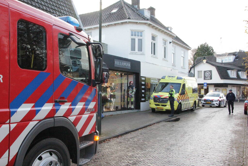 Kledingwinkel ontruimd, medewerker onwel