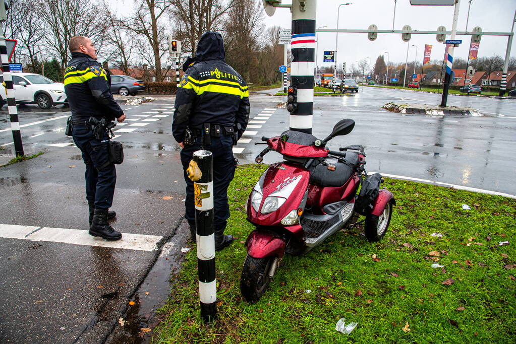 Botsing tussen auto en scooter