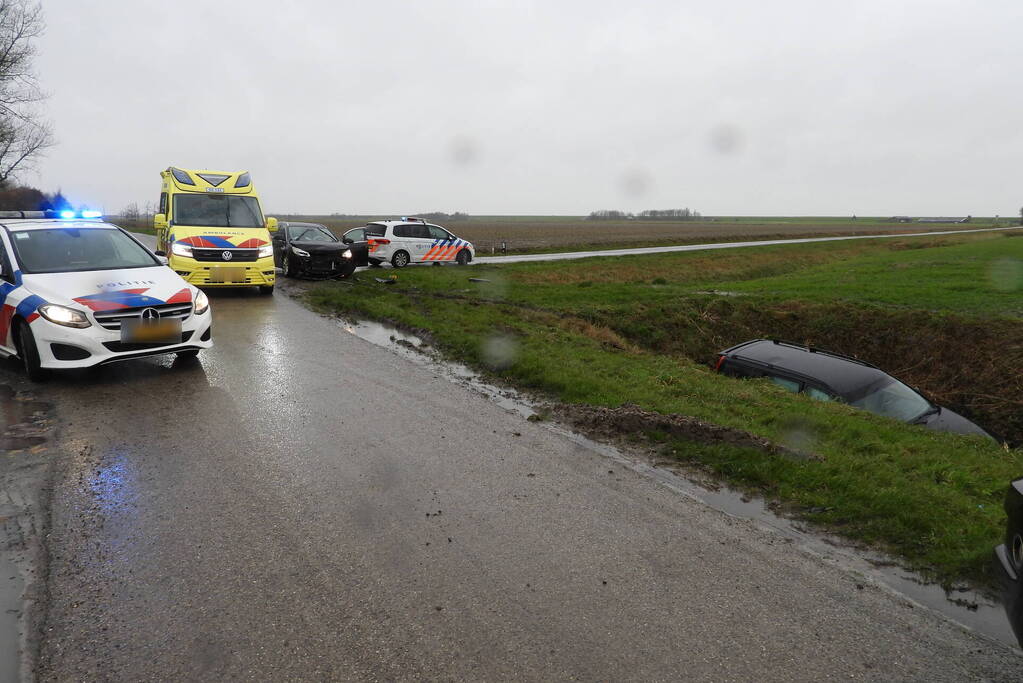 Flinke schade en voertuig te water na aanrijding