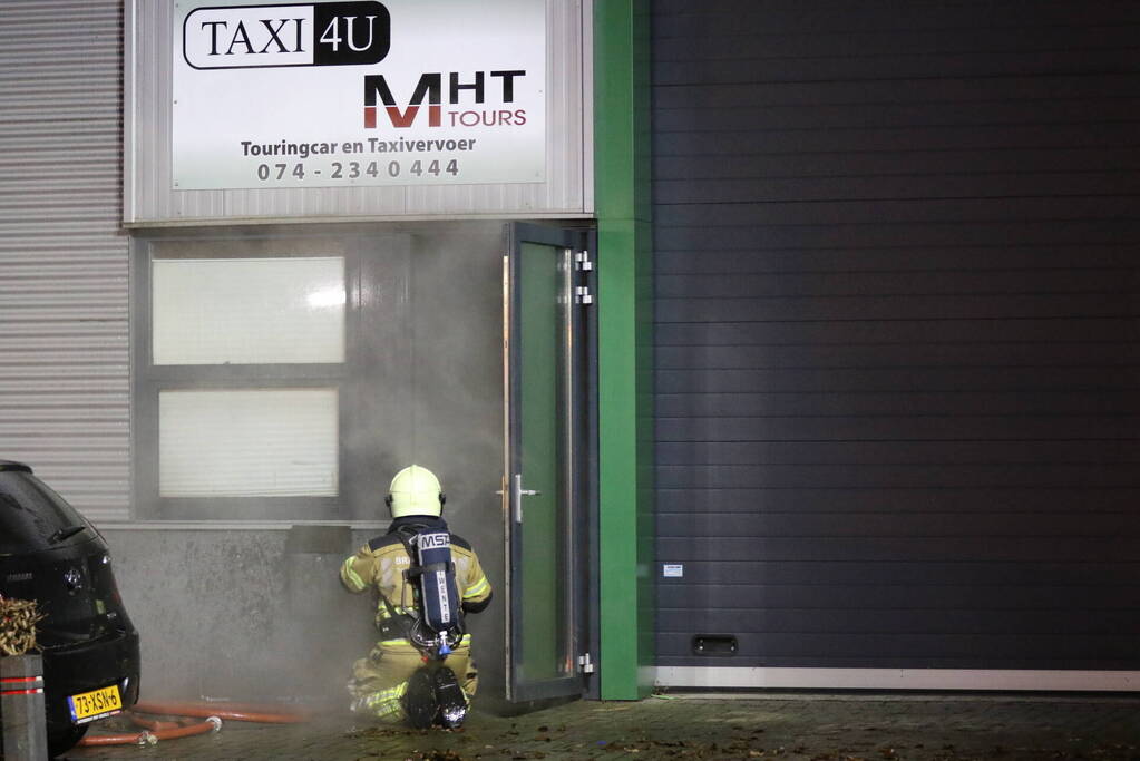 Uitslaande brand in bedrijfspand