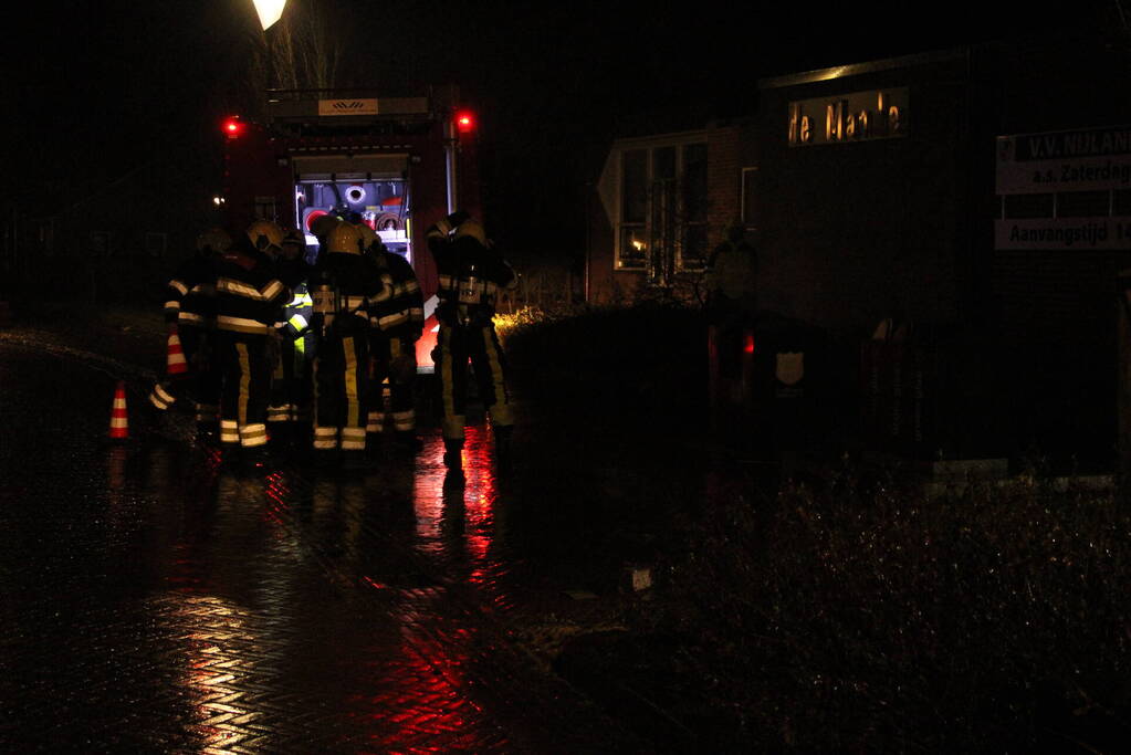Veel rook door brand in container
