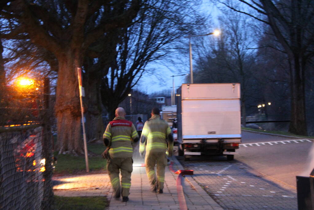Ondergrondse container in brand