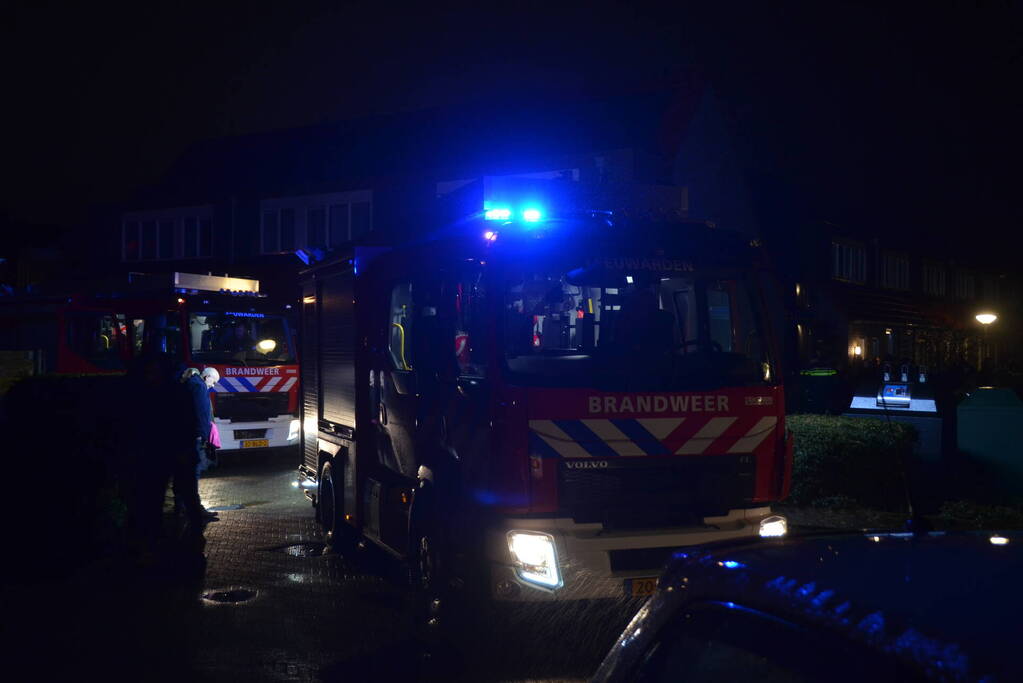 Brand in portiek woning