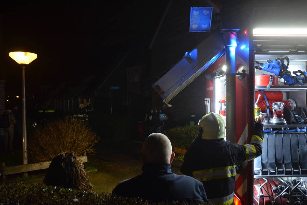 Brand in portiek woning