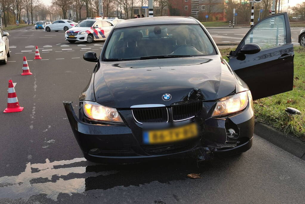 Automobilist ramt verkeerslicht